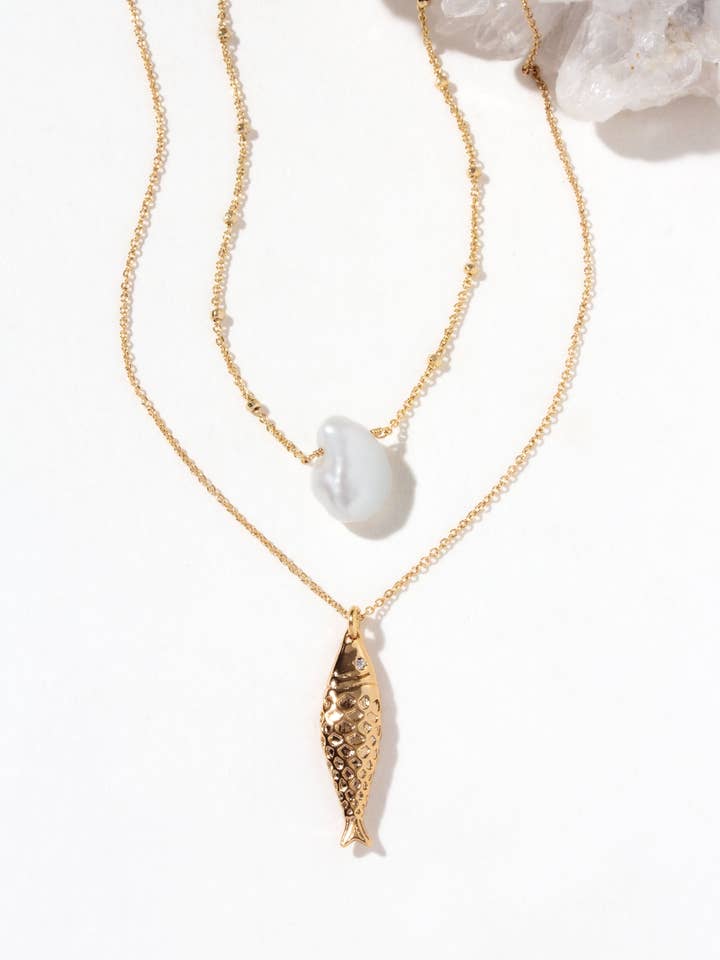 Golden Catch Necklace Set – Sardine Charm & Keshi Pearl for wholesale by Luna Norte