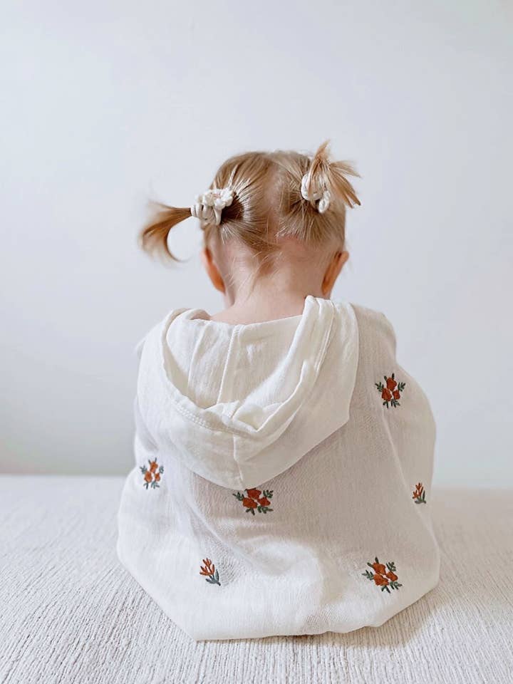 Floral Organic Muslin Poncho for Baby and Toddlers for wholesale by Ada Baby