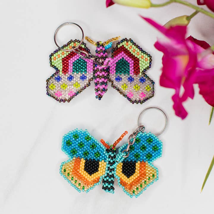 Porte-clés en perles papillon pour la vente par Lucia's Imports