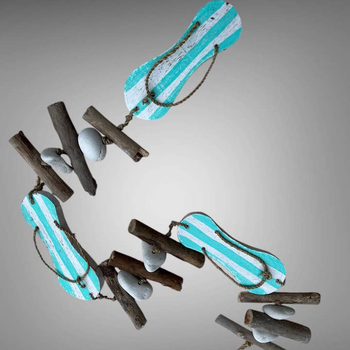 Mobile hanging hand carved flip flop - 100 cm and other Purchase wholesale just married flip flops. Free returns & net 60 terms on Faire trending on Faire.