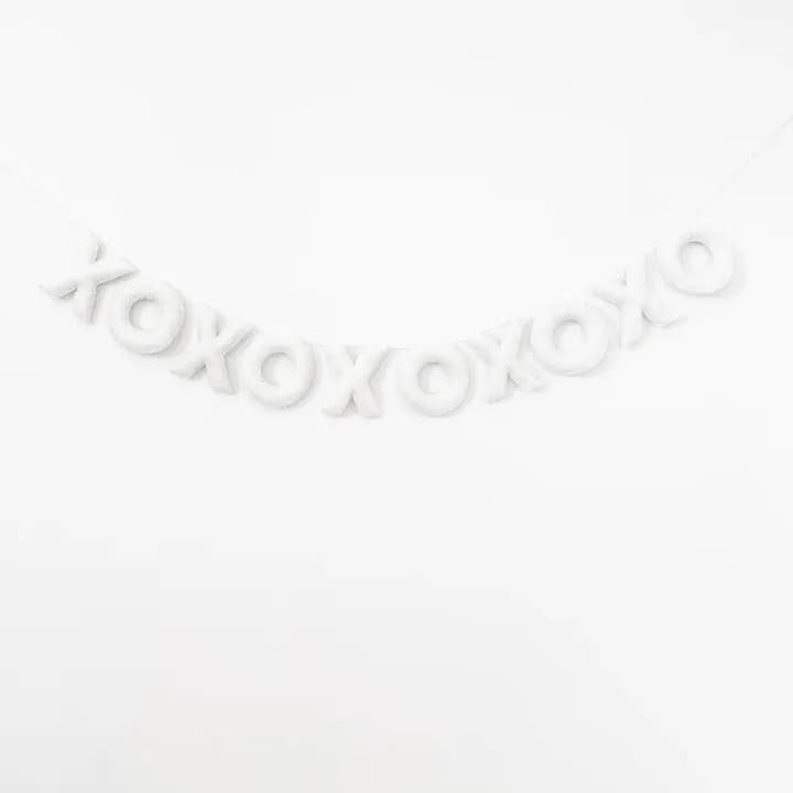White XOXOXOXOXO Felt Banner for wholesale by Glitter Party Co