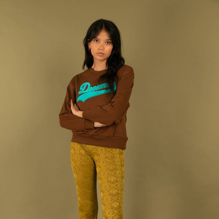 31518 DREAMER SWEATSHIRT and other Purchase Wholesale dreamer cap. Free Returns & Net 60 Terms on Faire trending on Faire.