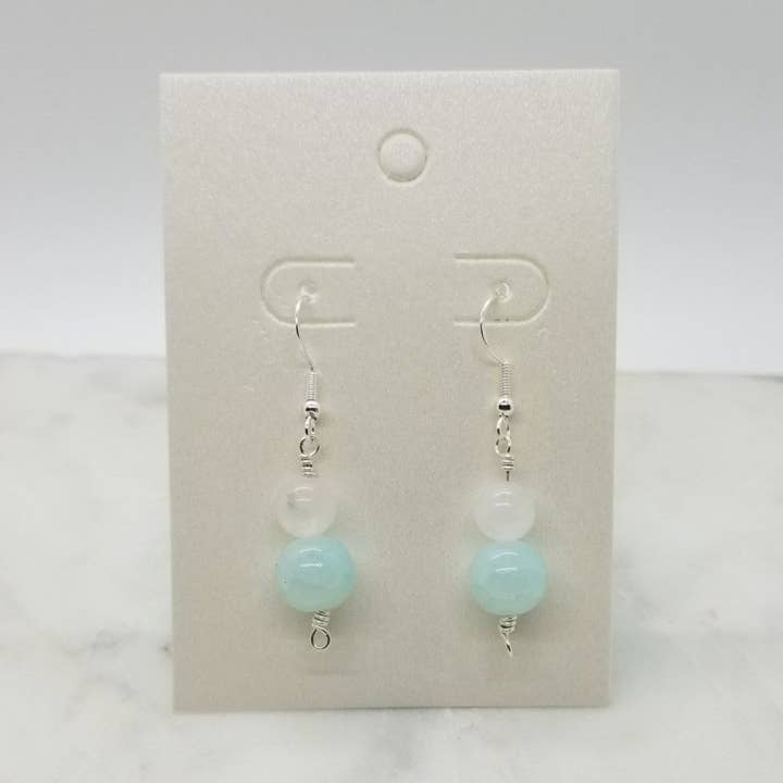 Pendientes de cristal azul claro y jade blanco para venta al por mayor de Elle Brands LLC