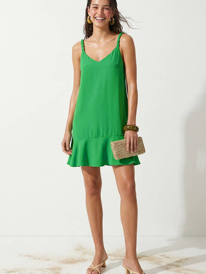 Robe mini sans manches à volants avec accent de bretelle pour la vente par Naked Zebra