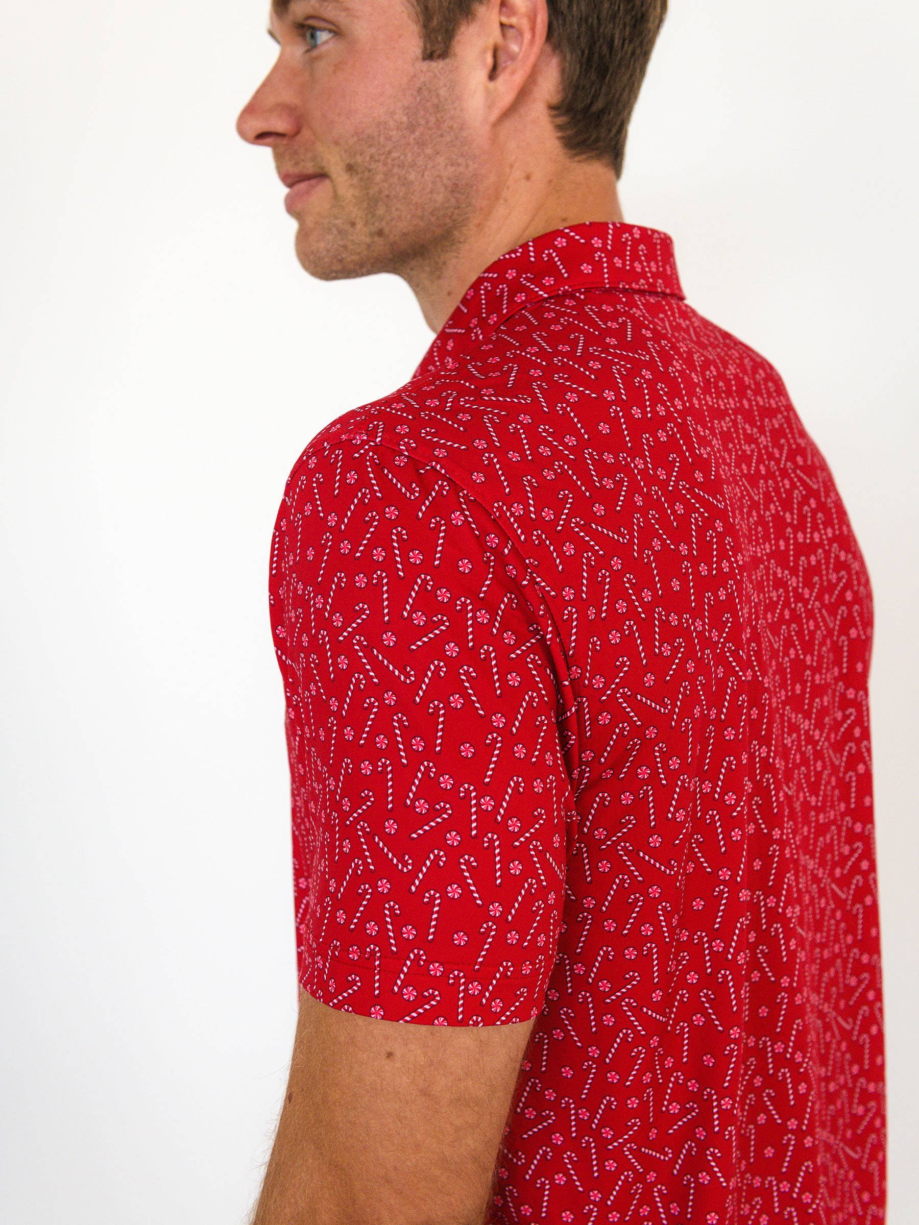 Red Men's Tiny Candy Canes Knit Short Sleeve Performance Polo for wholesale on Faire3