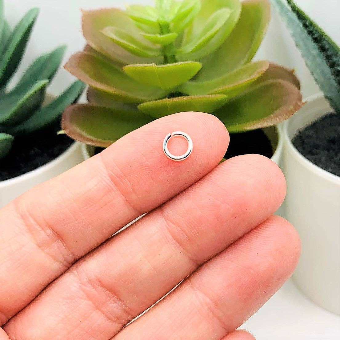 Guerrilla Charm - Wholesale Craft Supplies - 6mm, 18g, Bright Silver Plated Open Jump Rings1