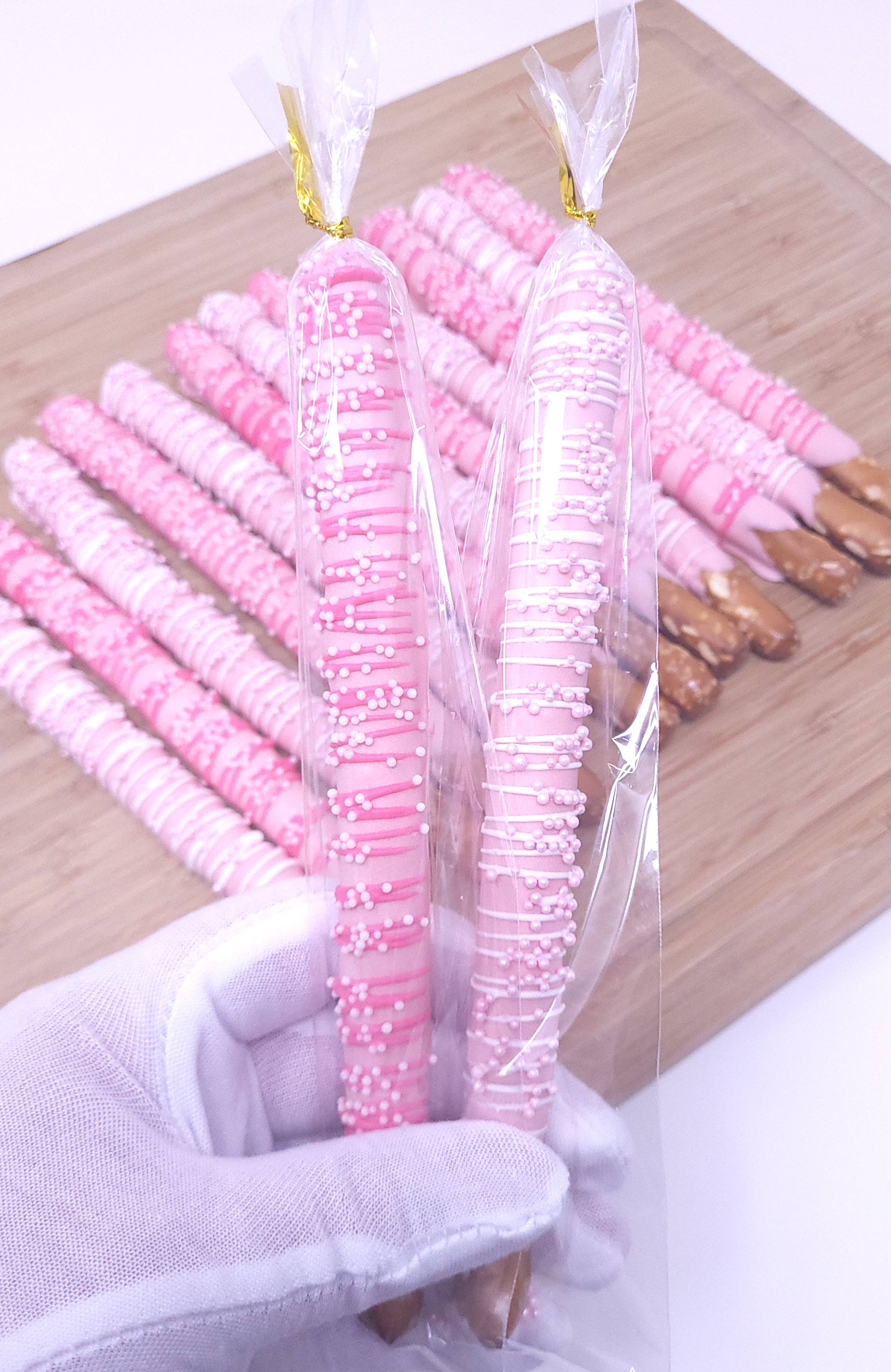 Wild Angel Treats, LLC - Wholesale Chocolate Covered Sweets - Chocolate Dipped Pretzel Rods - Pink2
