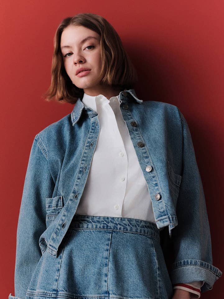 Chaqueta de camisa vaquera recortada azul para venta al por mayor de MANUKA