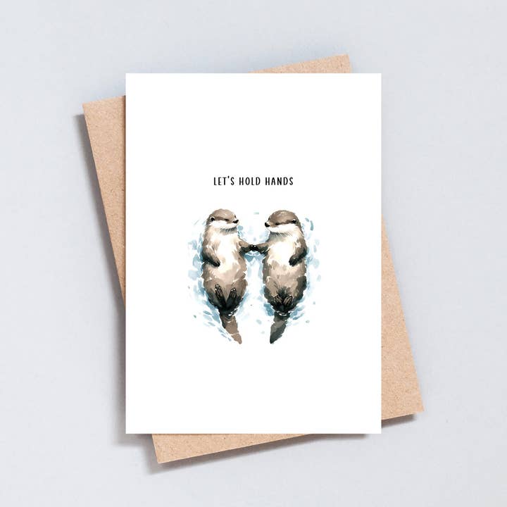 Let's Hold Hands, Otters Greeting Card for wholesale by The Type Club