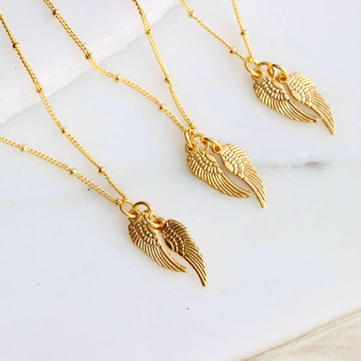 Tiny Angel Wings Necklace for wholesale by Mesa Blue