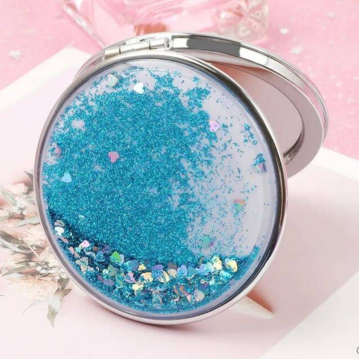 Glitter Quicksand Double-Sided Portable Mirror for wholesale by Keisha Elise Cosmetics