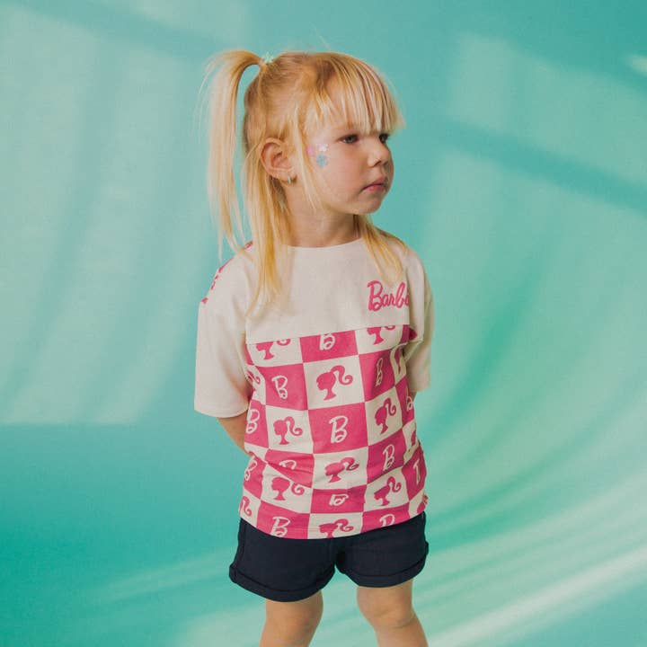 Drop Shoulder T-shirt - Barbie™ Check - Mattel Barbie-kollektionen av RAGS för wholesale av RAGS