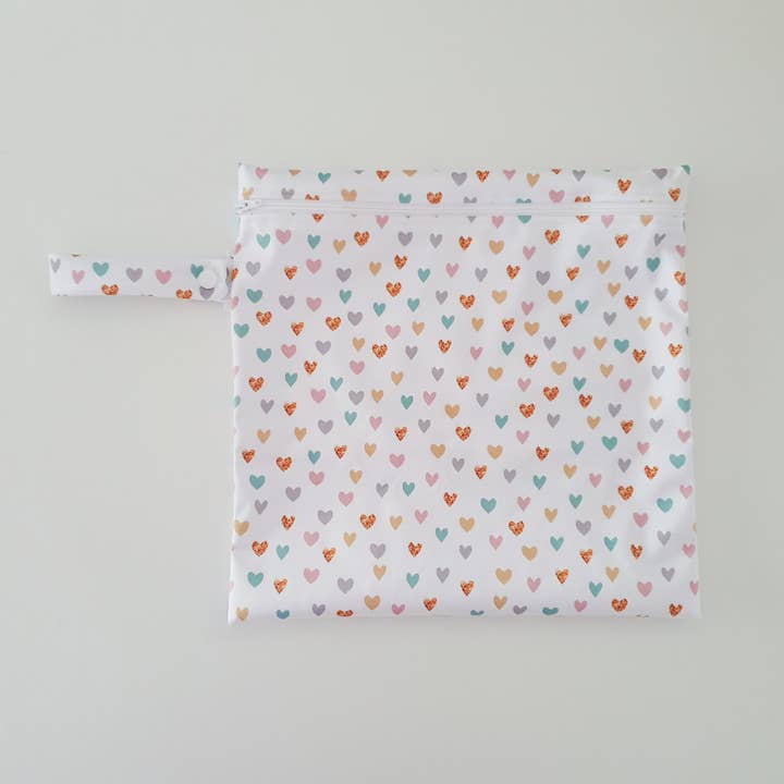 Wet bag hearts for wholesale by Ari Collective