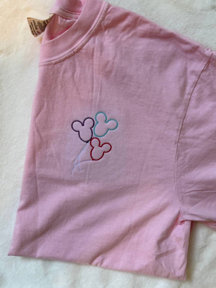 Whimsical Disney Balloon Tee for wholesale by A & C Embroidery
