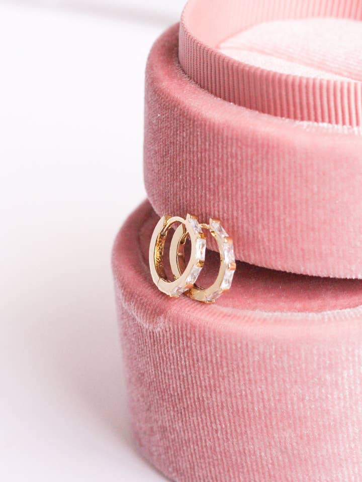 Gold Huggie Hoops for wholesale by Rachelyn Jewelry