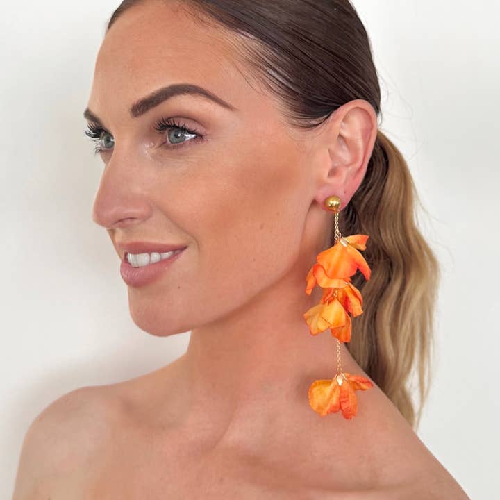 Phoenix Flame Orange Flower Earrings and other Purchase wholesale drop coffee. Free returns & net 60 terms on Faire trending on Faire.