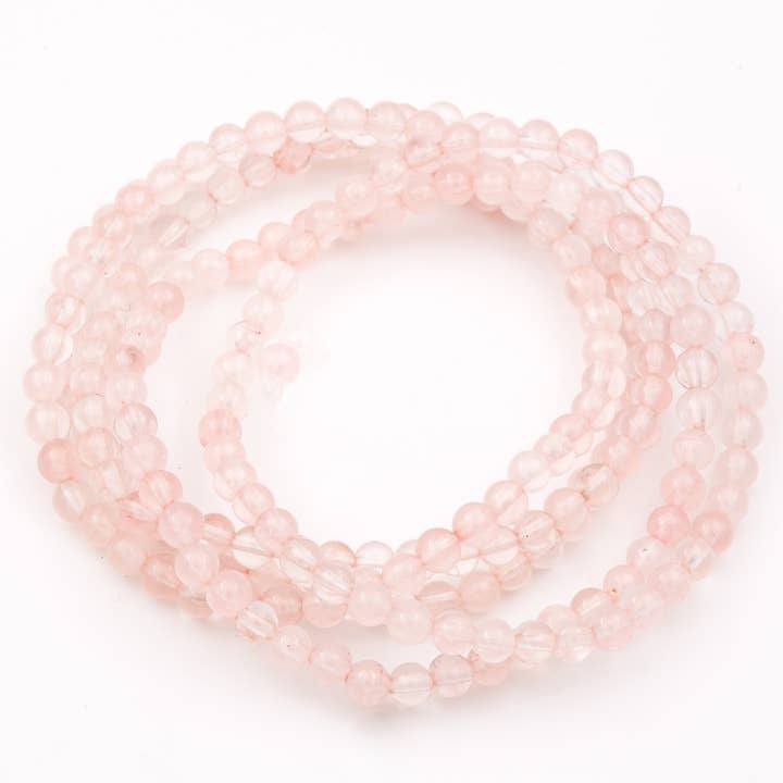 Bracciale con pietre preziose in quarzo rosa. per la vendita all'ingrosso da parte di Purple Girl Designs