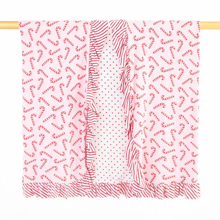 Couverture de Noël réversible à volants en bambou Candy Cane Lane - Rose pour la vente par Dreamiere