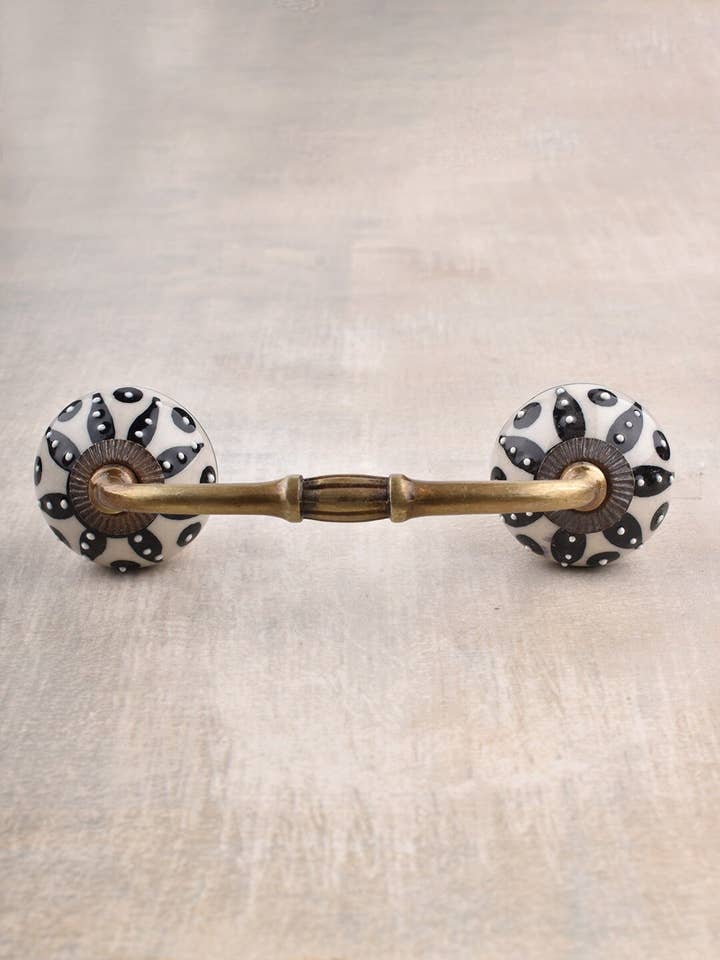 Black Embossed Flower on Cream Base Unique Ceramic Cabinet Handle Pull for wholesale by KNOBCO