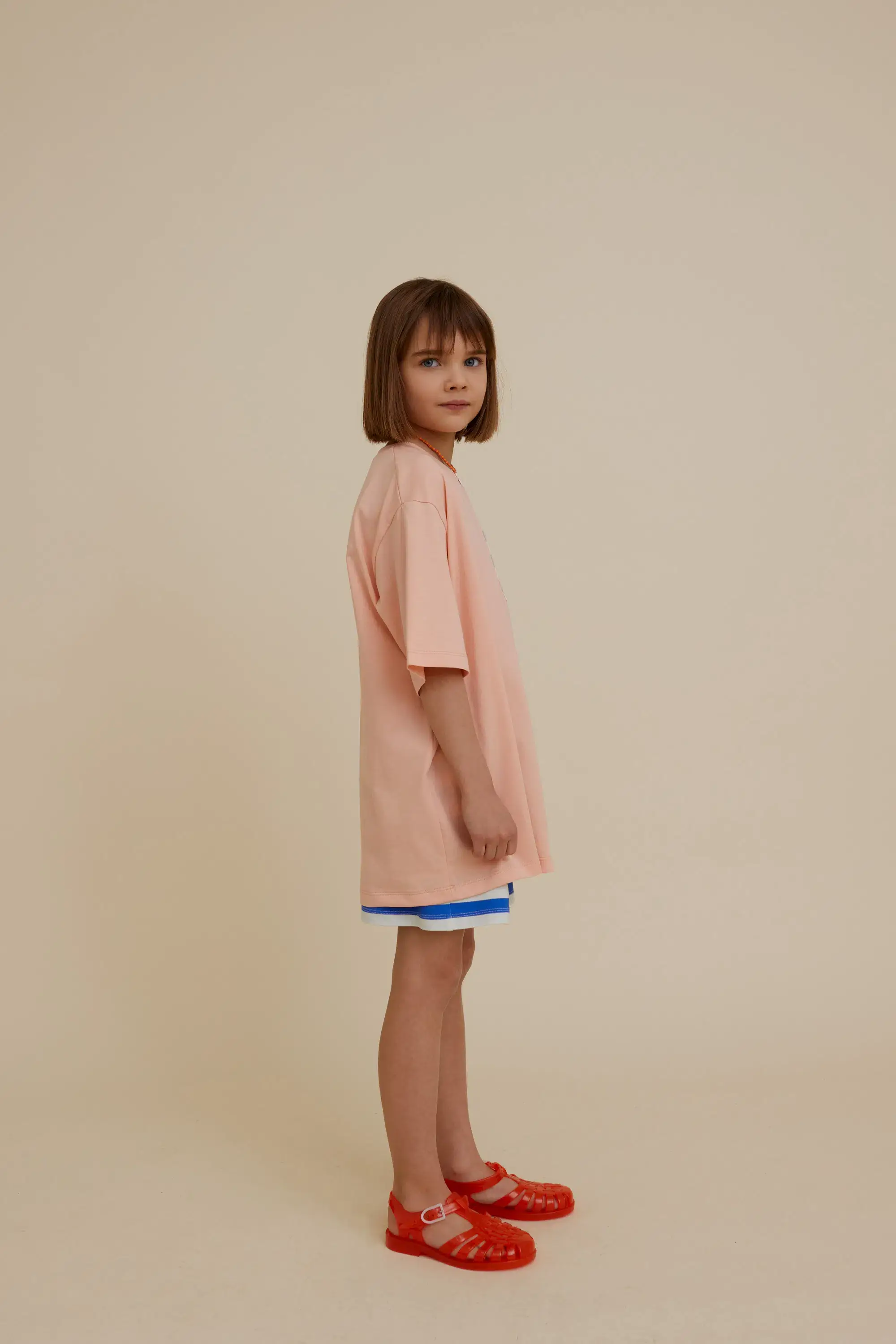 Rosa OVERSIZE T-SHIRT I EKOLOGISK BOMULL MED FICKA för wholesale på Faire2