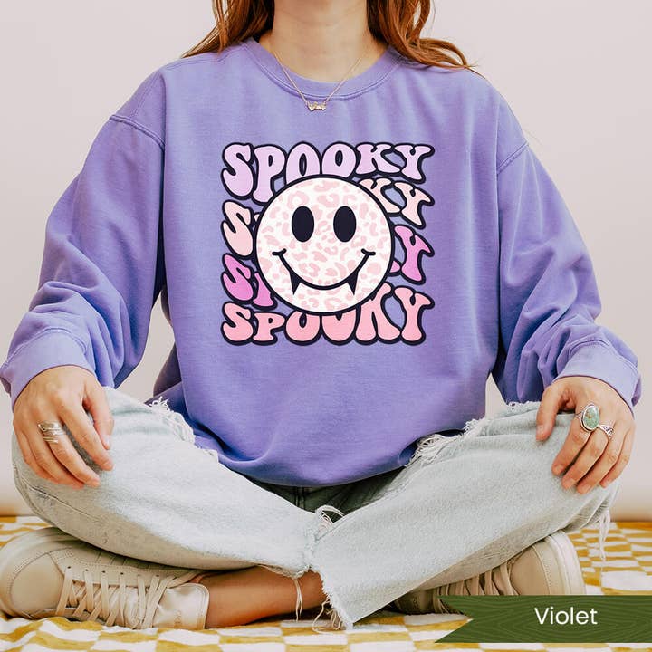 Wildflower Apparel Co. – wholesale Graphic sweatshirt – Women’s – Spooky Vampire Smiley