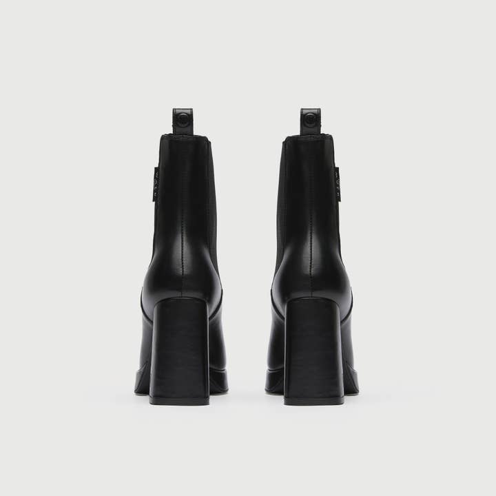 Black Poppy Chelsea Boot for wholesale on Faire