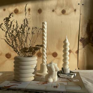 Purchase Wholesale taper candle molds. Free Returns & Net 60 Terms on Faire
