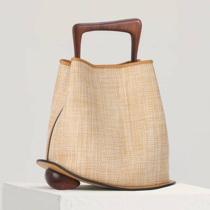 Ozzy Raffia Bag - Natural and other Purchase Wholesale raffia bag. Free Returns & Net 60 Terms on Faire trending on Faire.