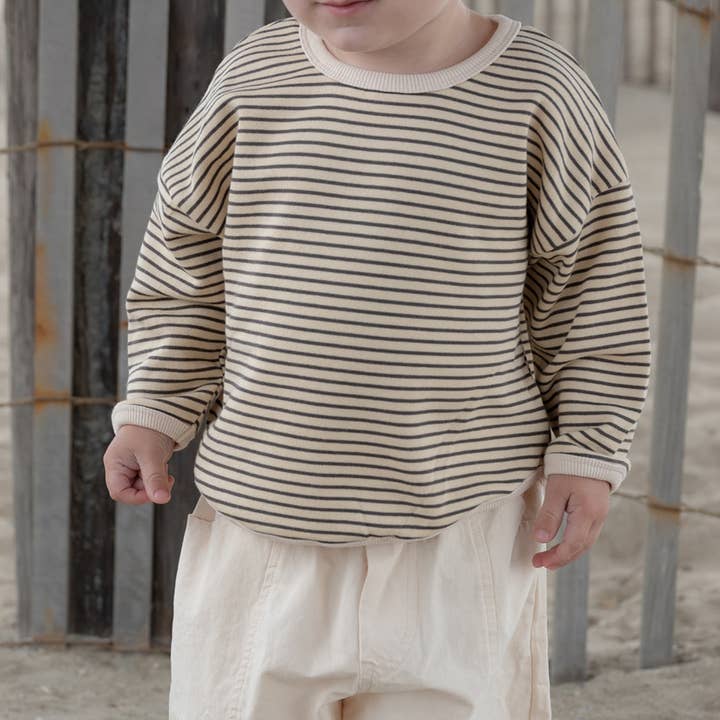 Pull léger crème avec rayure marron pour la vente par Rivi & Kin