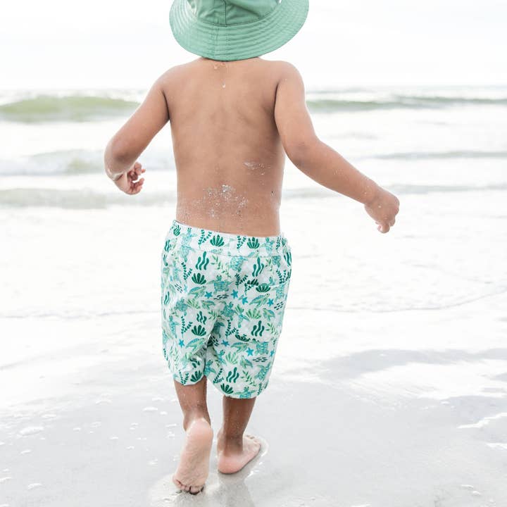 Green Save the Sea Turtles Boys Swim Trunks for wholesale on Faire5