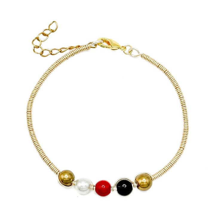 His-Story bangle bracelet for wholesale by Alegria Accessories Inc.