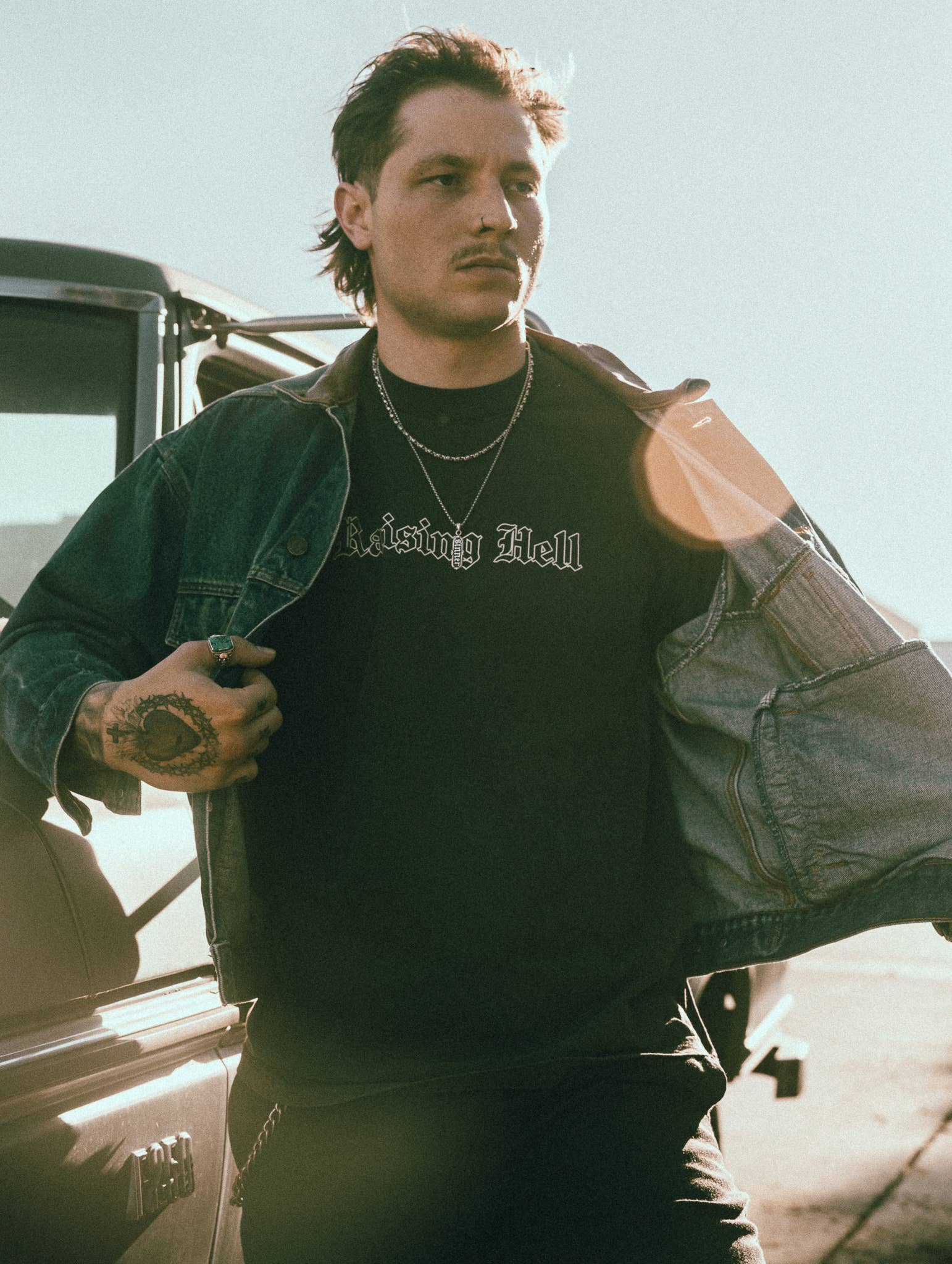 Washed Black Raising Hell Tee for wholesale on Faire1