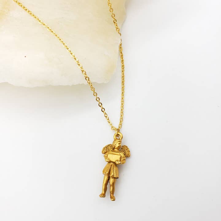 Faith Angel Charm Pendant for wholesale by Discoveries, Inc.