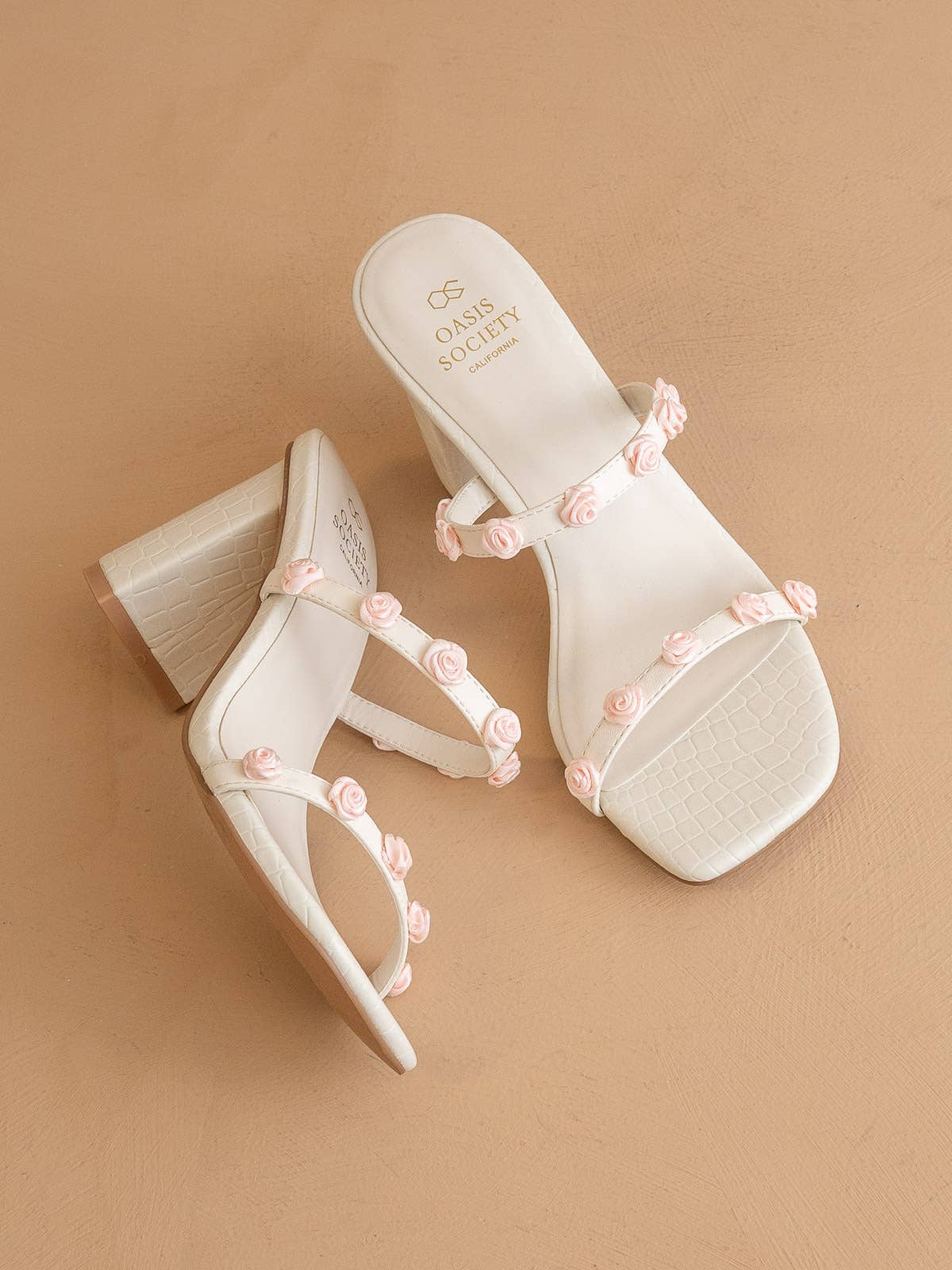 The Nia White | Rosette Adorned Heel for wholesale on Faire3