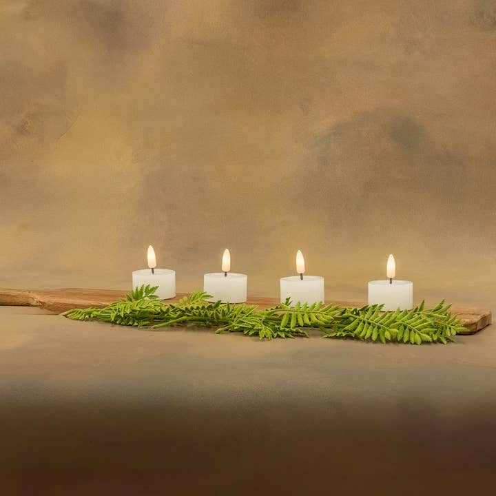 Set of 4 White Flameless Tealight Candles for wholesale on Faire1