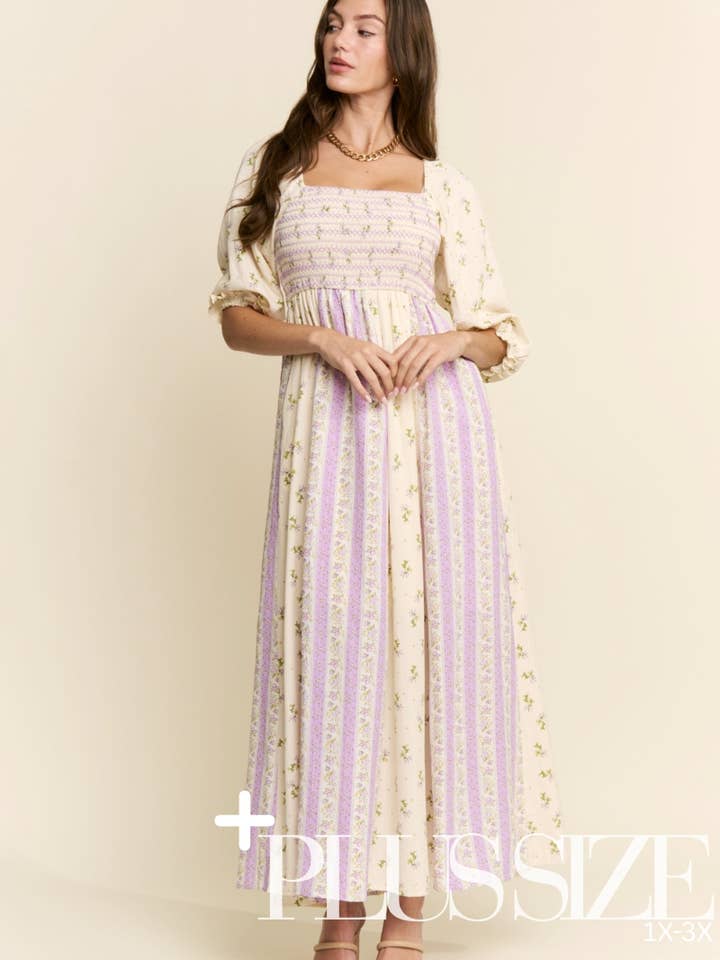 BLOMMÖNSTER SMOCKAD KLÄNNING för wholesale av J.NNA