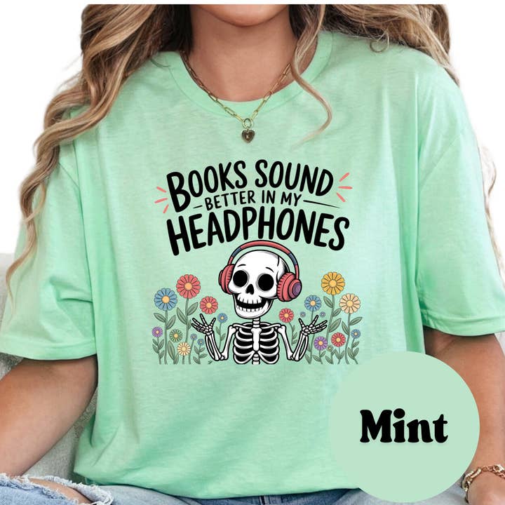 Purely Bookish - Wholesale T-Shirt (Graphic) - Women's - Books Sound Better in My Headphones Shirt – Funny Audiobook Lover Tee – Skeleton Reading Shirt – Spooky Bookish Graphic Tee – Book Nerd Gift3
