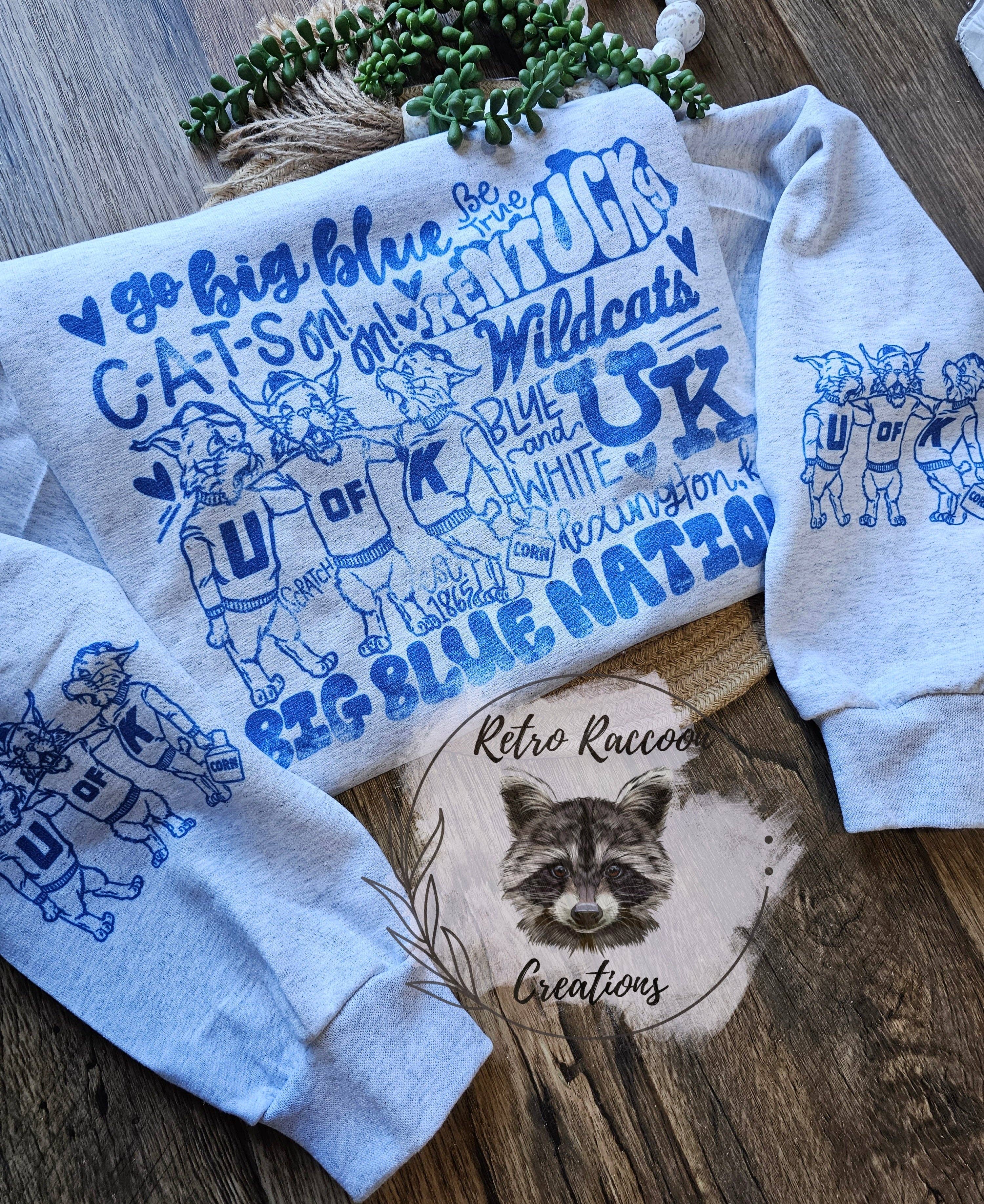 Retro Raccoon Creations - Wholesale Graphic Sweatshirt - Unisex - Big Blue Nation Cats0