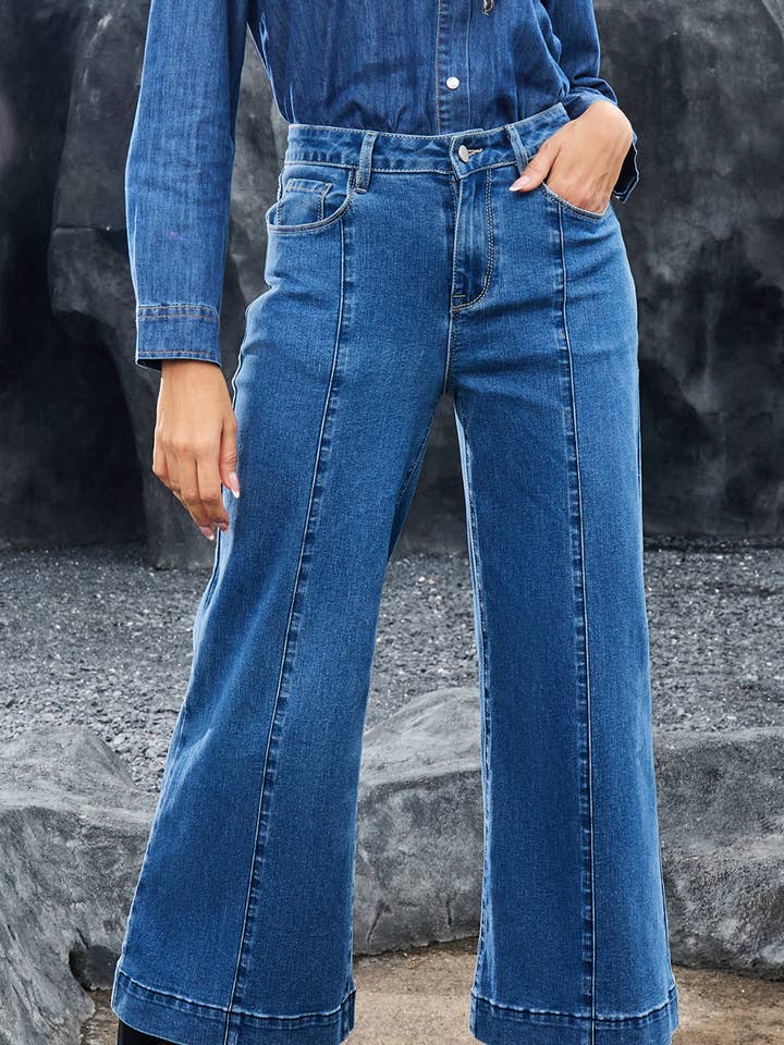 Donkerblauwe effen jeans met naaddetail en uitlopende pijpen tot op de enkel. voor wholesale door Lovesoft