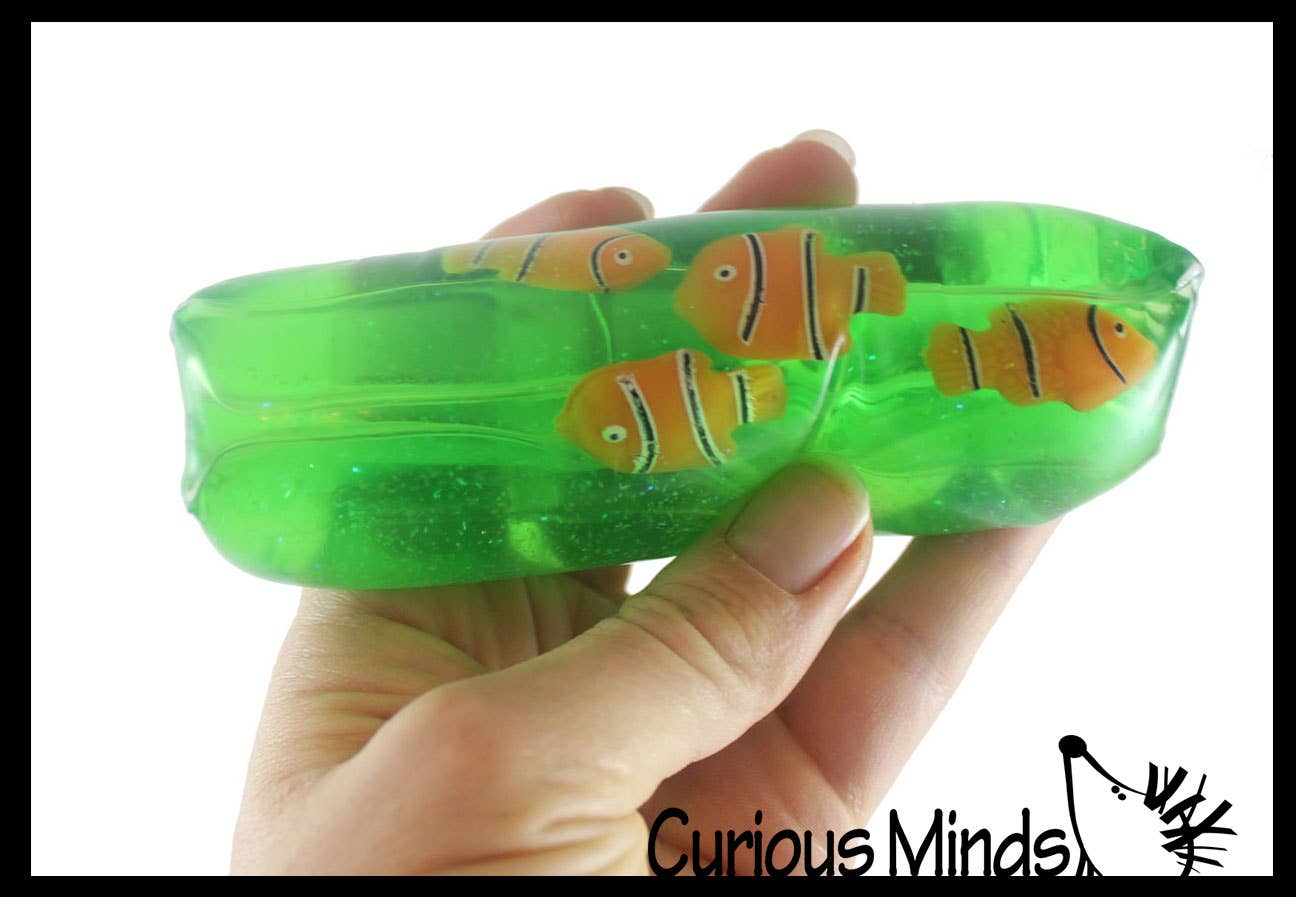Curious Minds Toys - Vente Jouet mou – enfant et bébé - 1 tube rempli d'eau, poisson-clown, animal de mer, serpent1