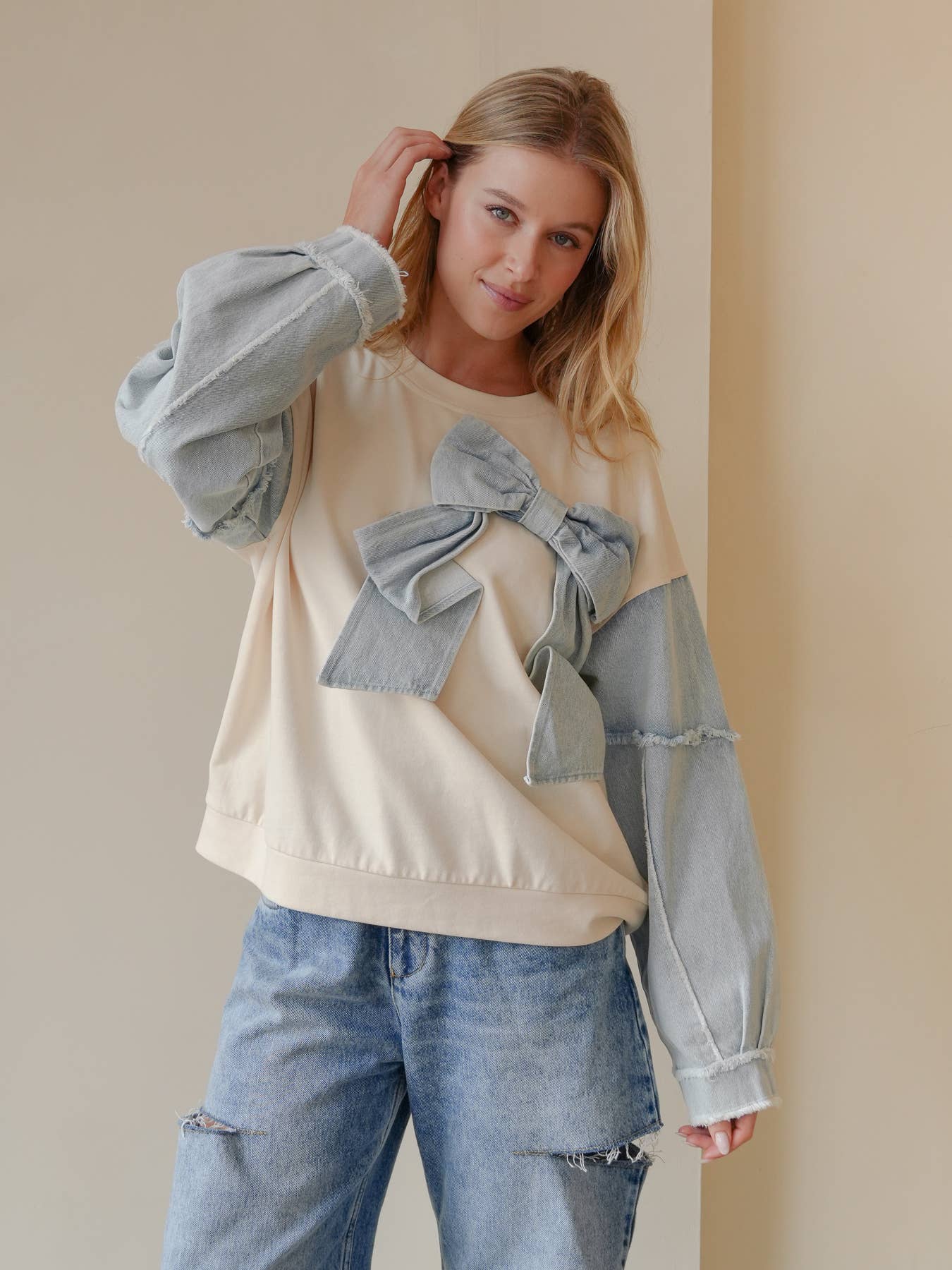 TRENDILITY - Wholesale Sweatshirt - Women's - TR2027-04_Mineral Washed Denim Bow Sweatshirt Top0