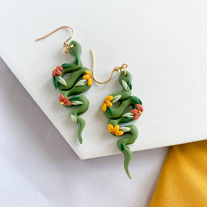 Green Floral Snake Clay Earrings for wholesale by Peripheral US