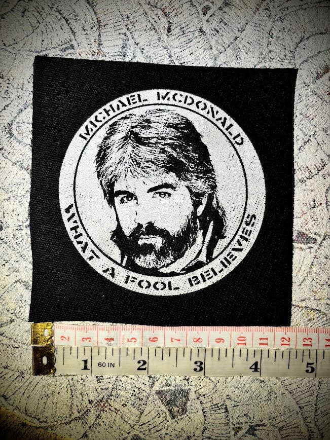 Michael McDonald, what a fool believes crust punk patch. for wholesale by Three Raccoons