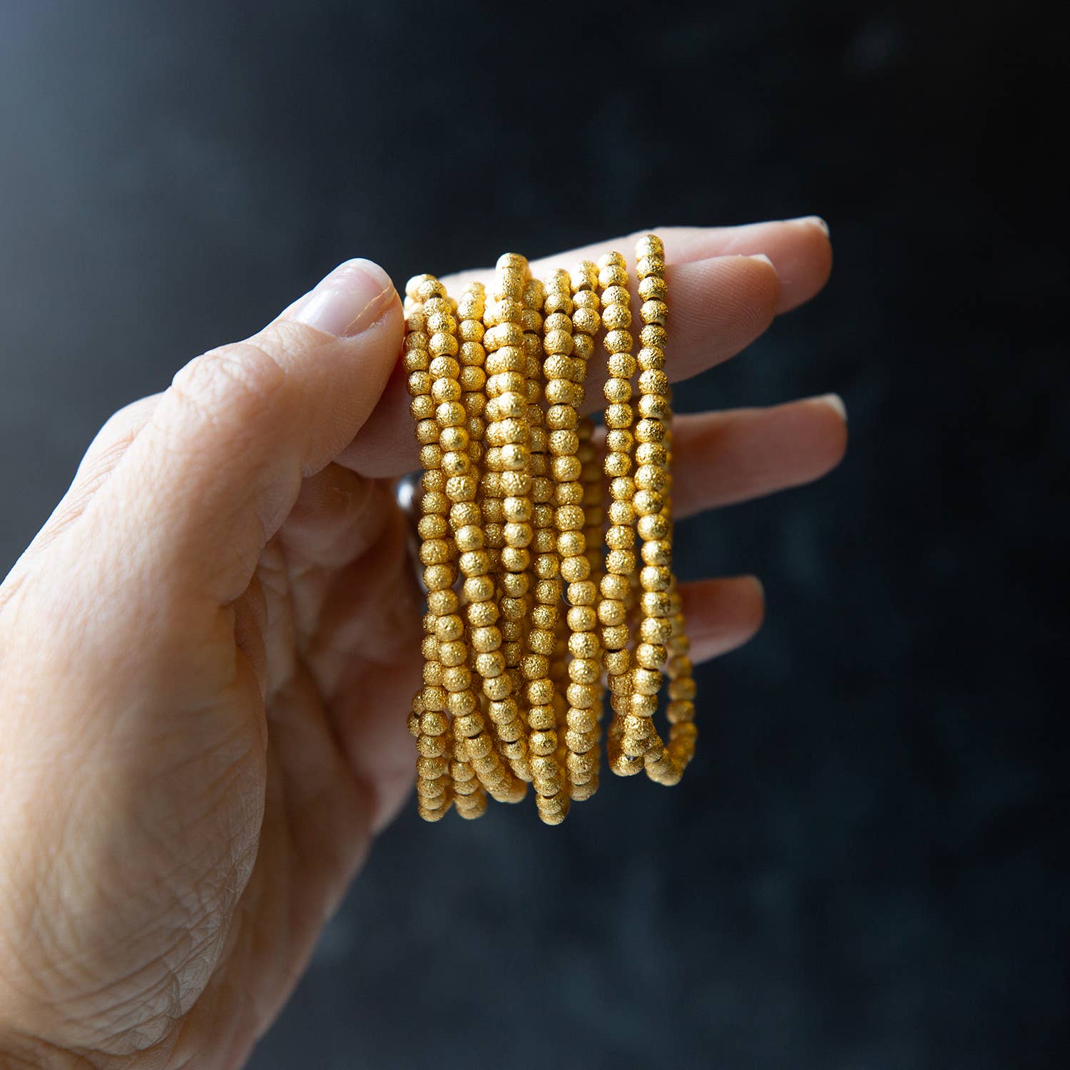 Lenny & Eva – wholesale Beaded bracelet – Gold Beaded Bracelets-4mm, Textured, Stretch, Long Wear1