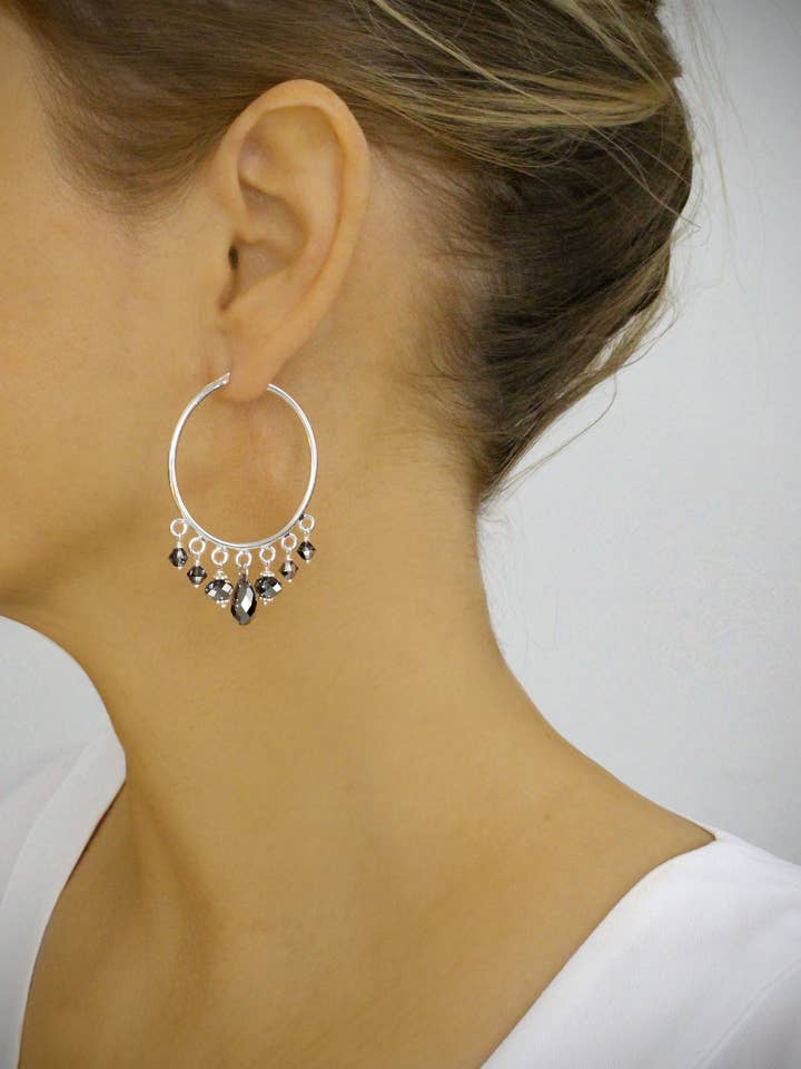 Rhodium plated hoop earrings with Black Diamond crystals  for wholesale by DIGE DESIGNS