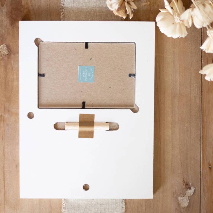 White Lily Frame Vertical-Blush & Baubles - Millennial Christmas for wholesale on Faire5