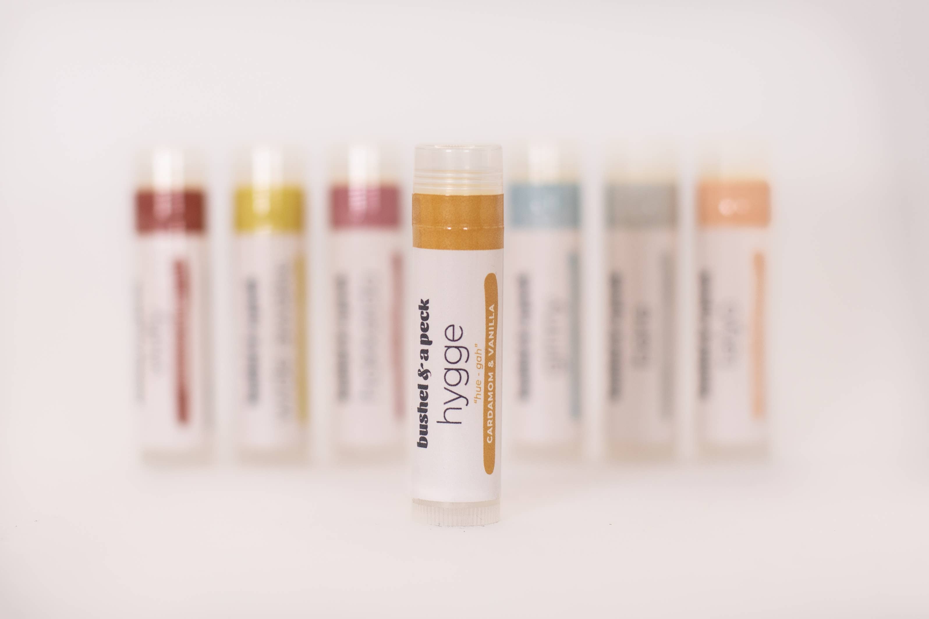 Bushel & a Peck Organic Skincare and Beauty - Wholesale Lip Balm - Hygge Lip Balm: Cardamom + Vanilla1