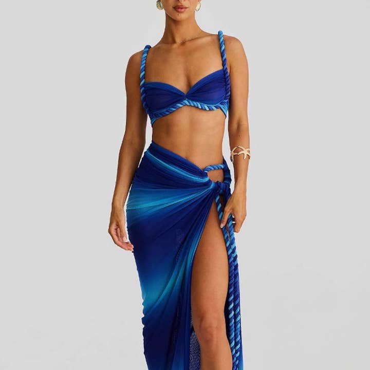 Strappy Bikini Top and Wrap Skirt Set and other Purchase Wholesale swimwear set. Free Returns & Net 60 Terms on Faire trending on Faire.