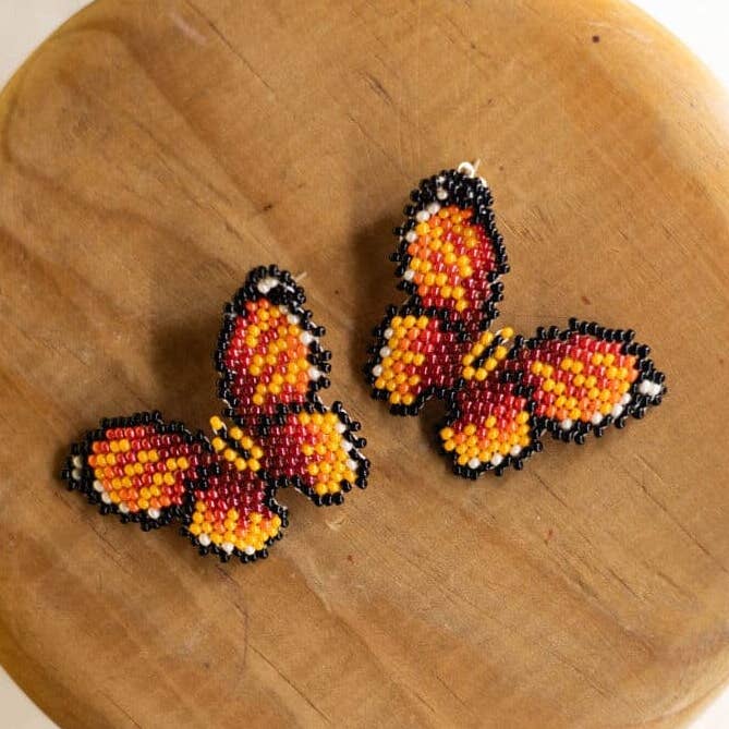 Little Tiger – Native Beaded Butterfly Earrings in Orange for wholesale by Mother Sierra