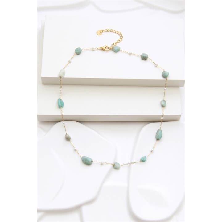 gold Stainless steel necklace adorned with natural stones and pe for wholesale on Faire1